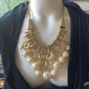 Chunky gold and pearl necklace. Really cute!